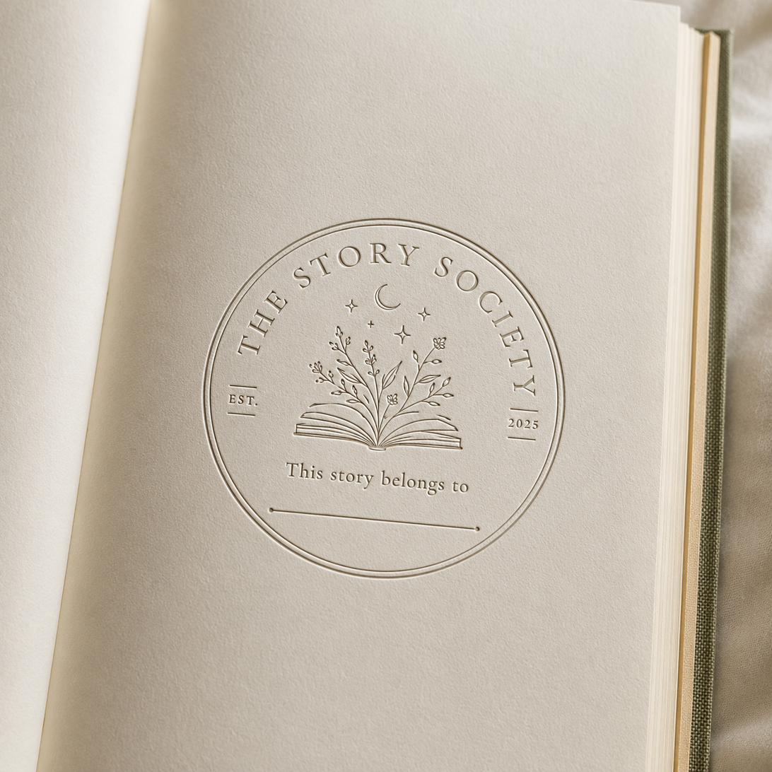 Our logo pressed into the inside page of a book